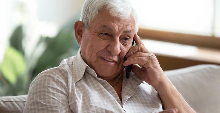 Older white man on the phone