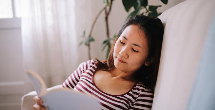 Woman reading at home