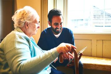 Older woman having an assessment with a care worker