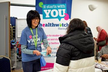 Volunteer on Healthwatch stall