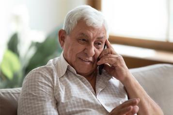 Older white man on the phone