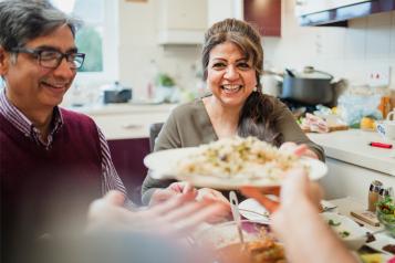 Family eating dinner at a table