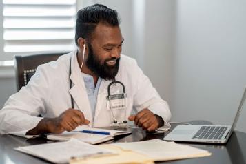 Hospital doctor having an online consultation