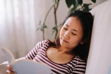 Woman reading at home