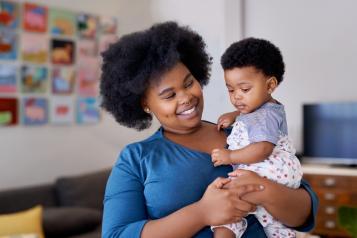 Women holding her baby