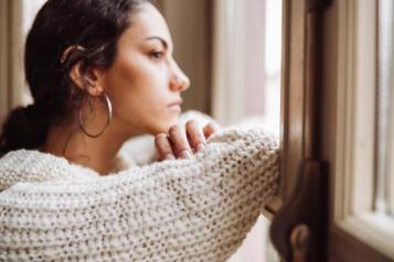 Young woman at window