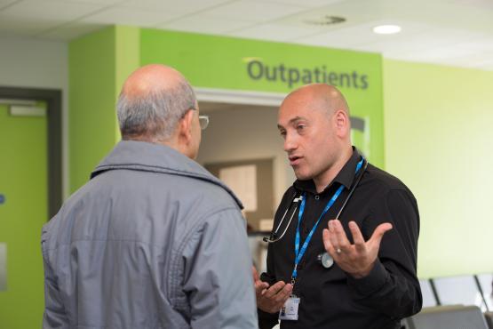 Doctor speaking to a patient in an outpatient clinic