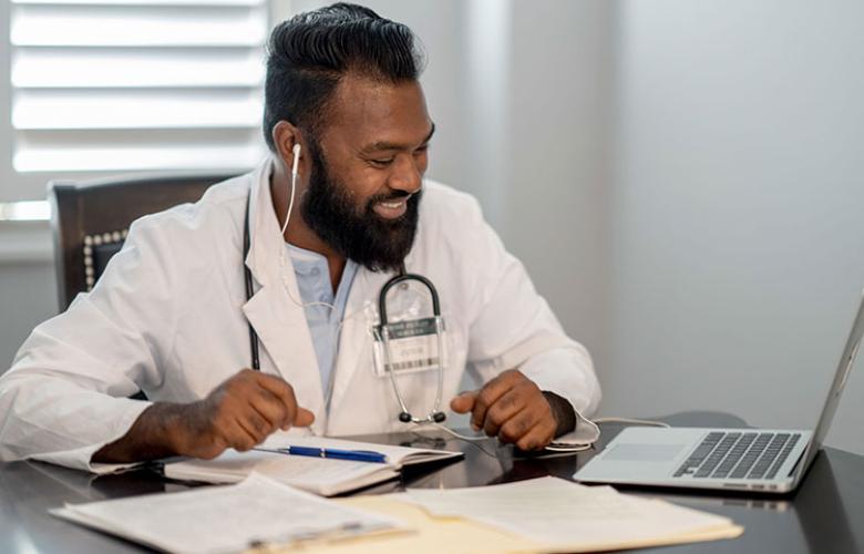 Hospital doctor having an online consultation